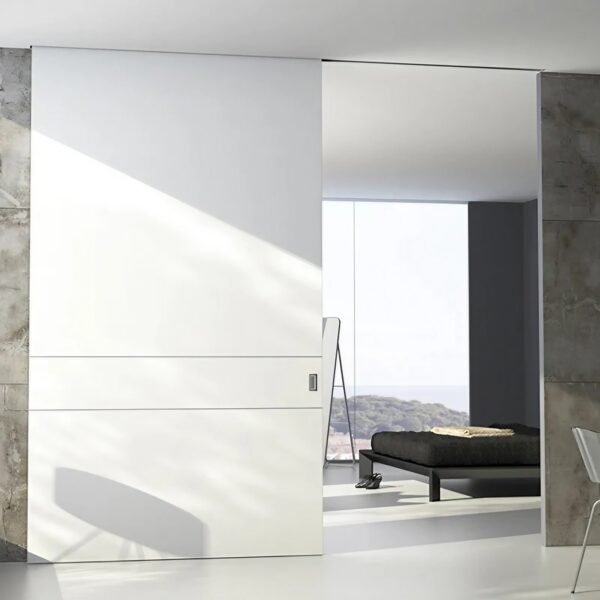 Guía integrada invisible para puertas correderas con sistema oculto de deslizamiento.